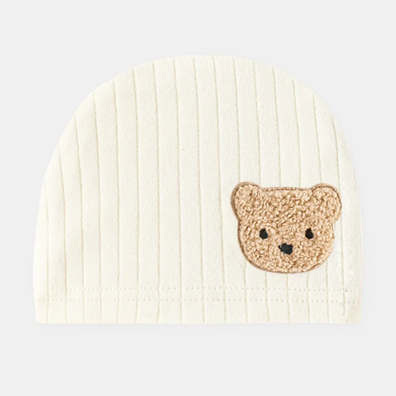 Beige baby beanie hat for infants with teddy bear patch – cozy winter wear