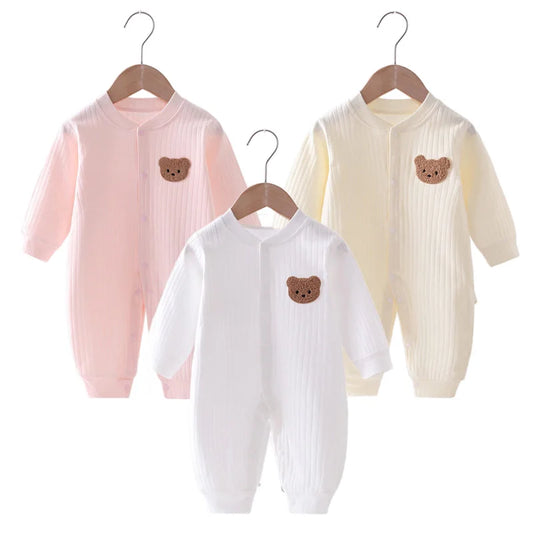 Soft cozy baby rompers in pink, white, and yellow — ideal for baby girls and boys during autumn and winter.