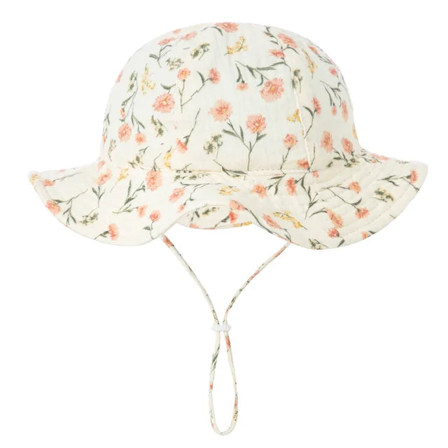 Newborn beach hat with flower design and chin strap